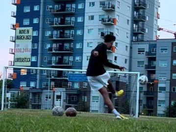 Ali playing soccer